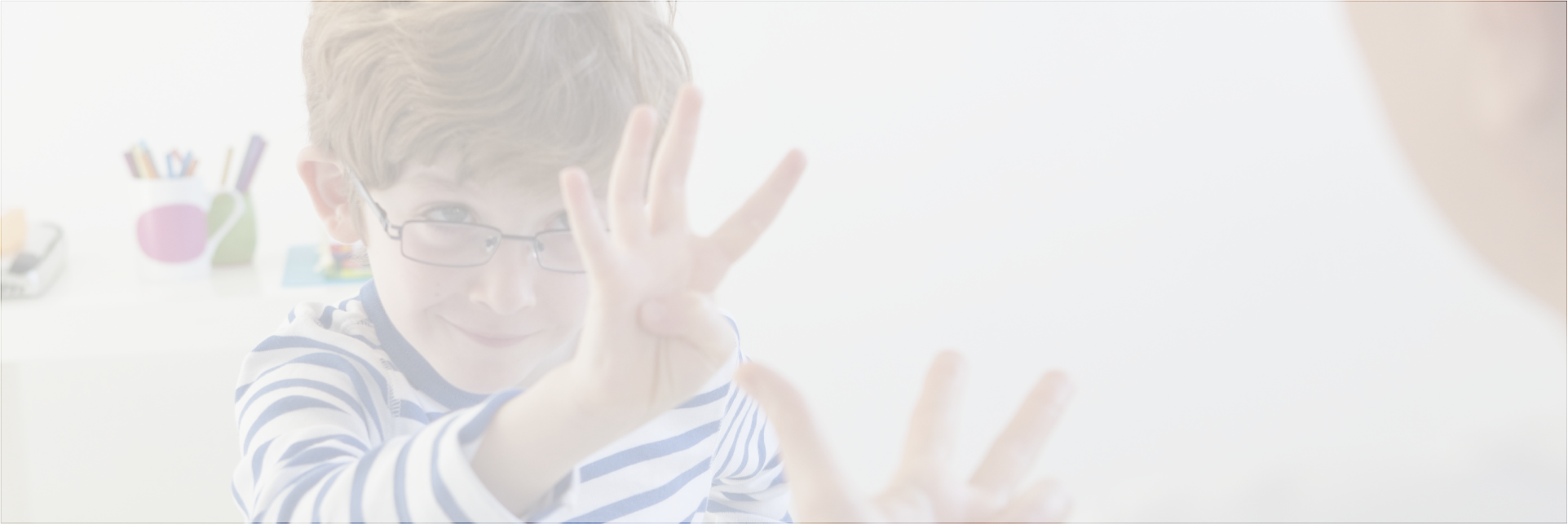 Boy counting on fingers